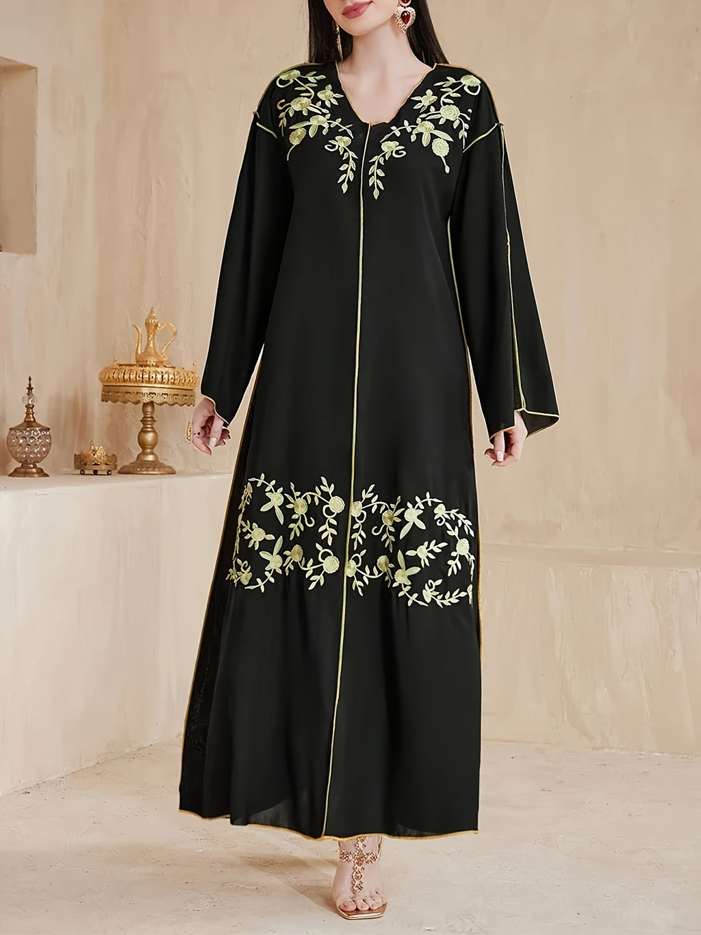 A Mid-Length Dress with a V-Neck, Flared Sleeves, And Slit Design, Featuring Elegant And Luxurious Heat Transfer Craftsmanship, Suitable for The Eid Celebration, Resembling a Traditional Abaya