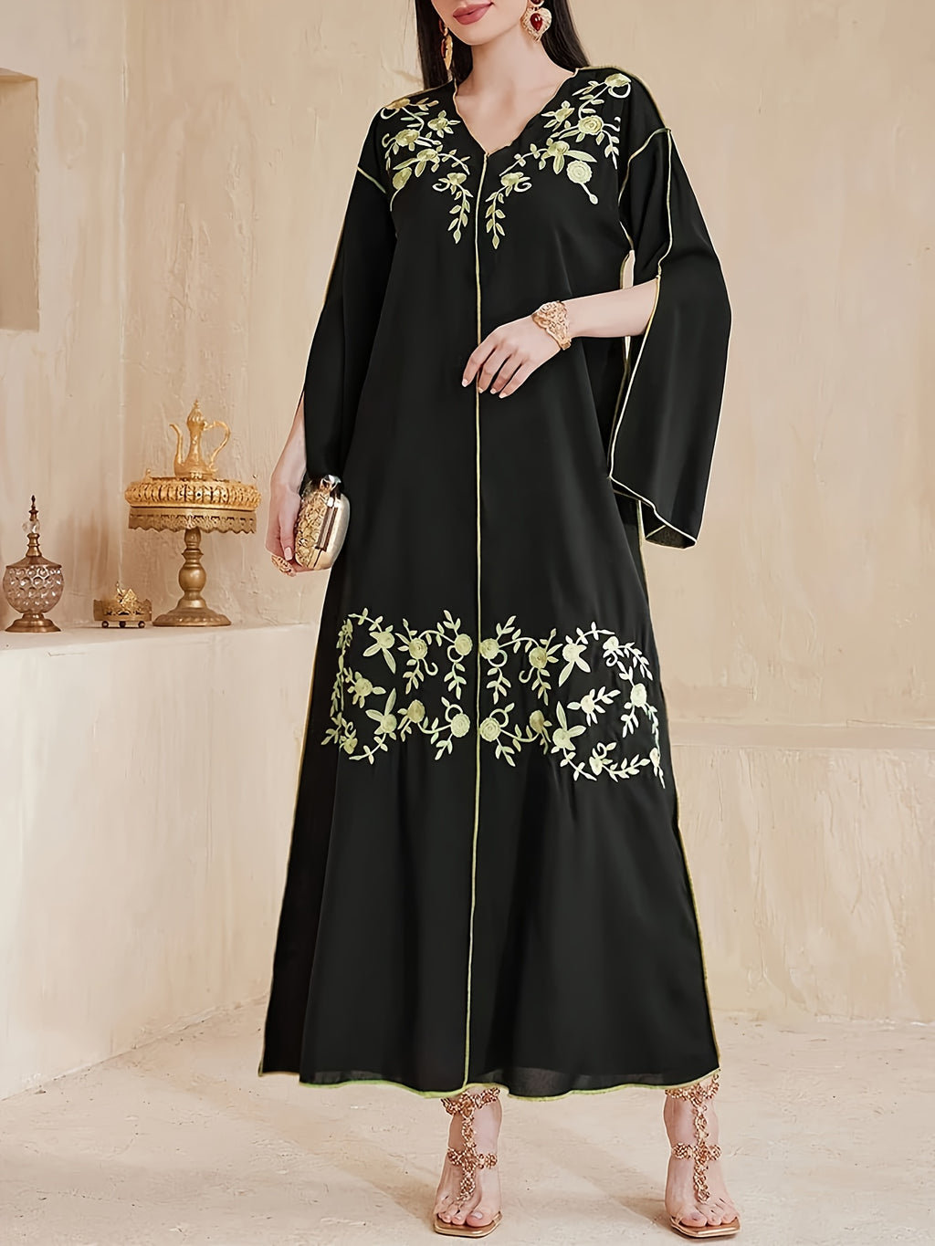 A Mid-Length Dress with a V-Neck, Flared Sleeves, And Slit Design, Featuring Elegant And Luxurious Heat Transfer Craftsmanship, Suitable for The Eid Celebration, Resembling a Traditional Abaya
