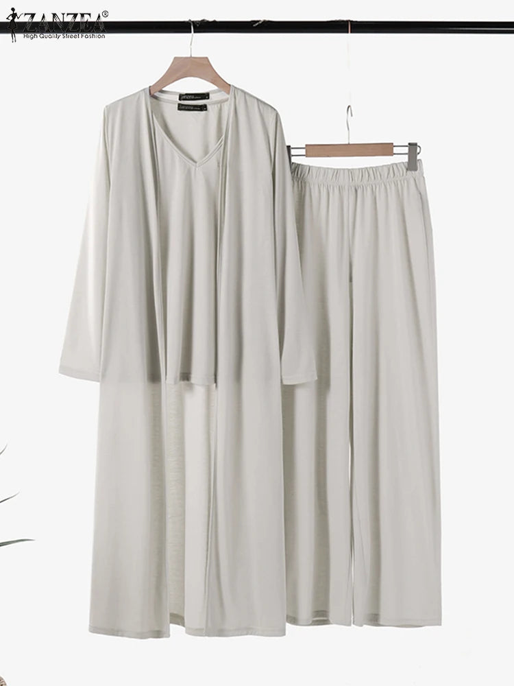 طقم نسائي أنيق ثلاث قطع – توب بدون أكمام مع كارديجان طويل وبنطال واسع مريح