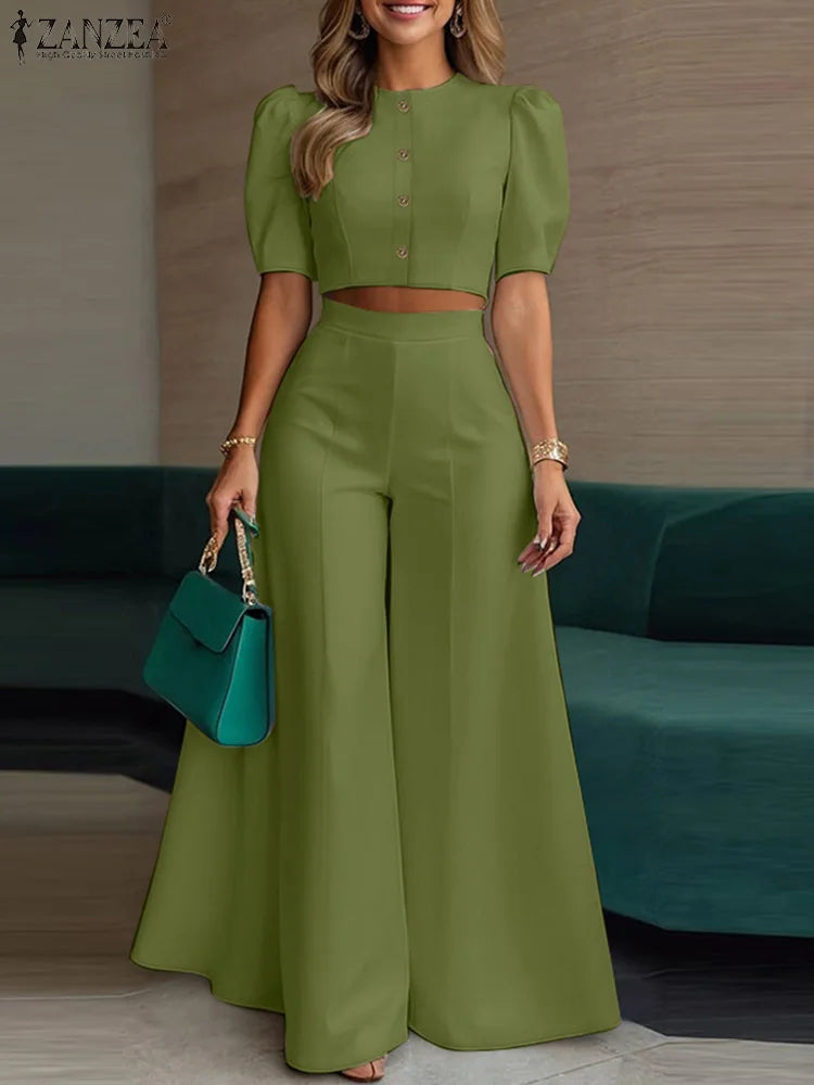 طقم نسائي صيفي أنيق قطعتين – بلوزة قصيرة بأكمام منفوشة مع بنطال واسع