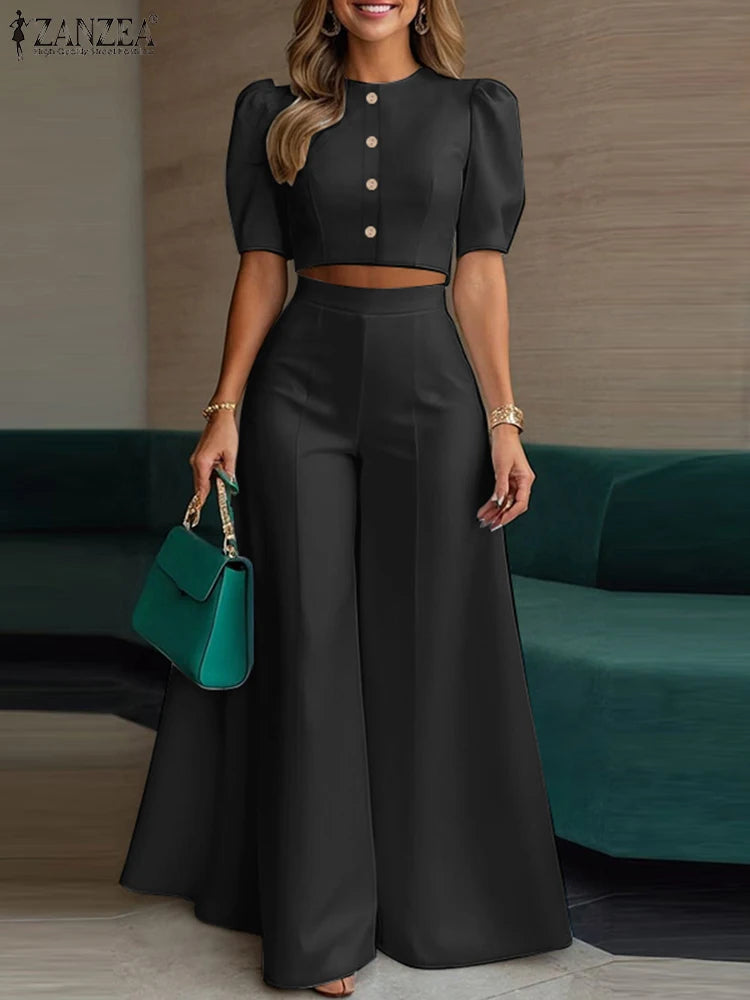 طقم نسائي صيفي أنيق قطعتين – بلوزة قصيرة بأكمام منفوشة مع بنطال واسع