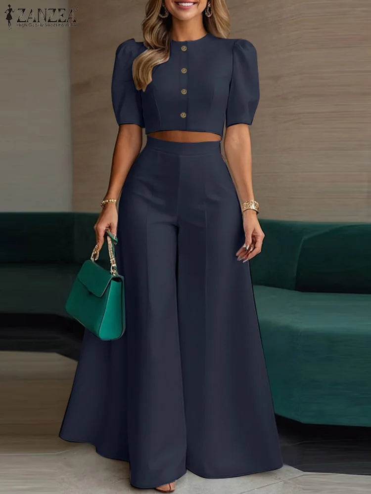 طقم نسائي صيفي أنيق قطعتين – بلوزة قصيرة بأكمام منفوشة مع بنطال واسع