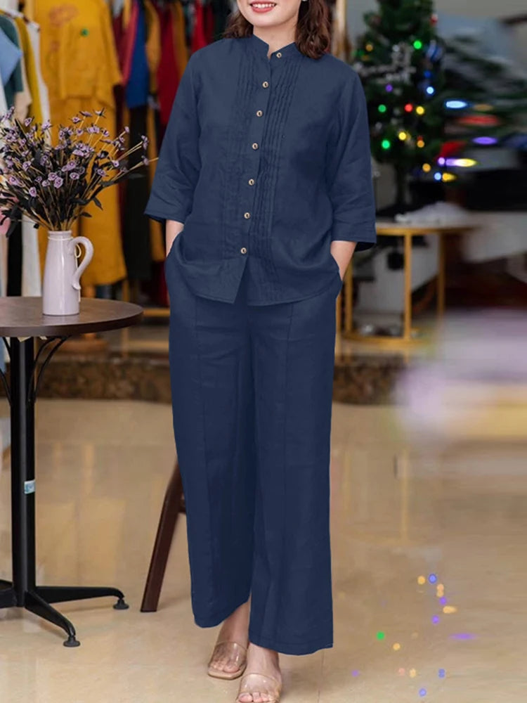 طقم نسائي أنيق قطعتين – بلوزة بأكمام طويلة وياقة واقفة مع بنطال واسع مريح