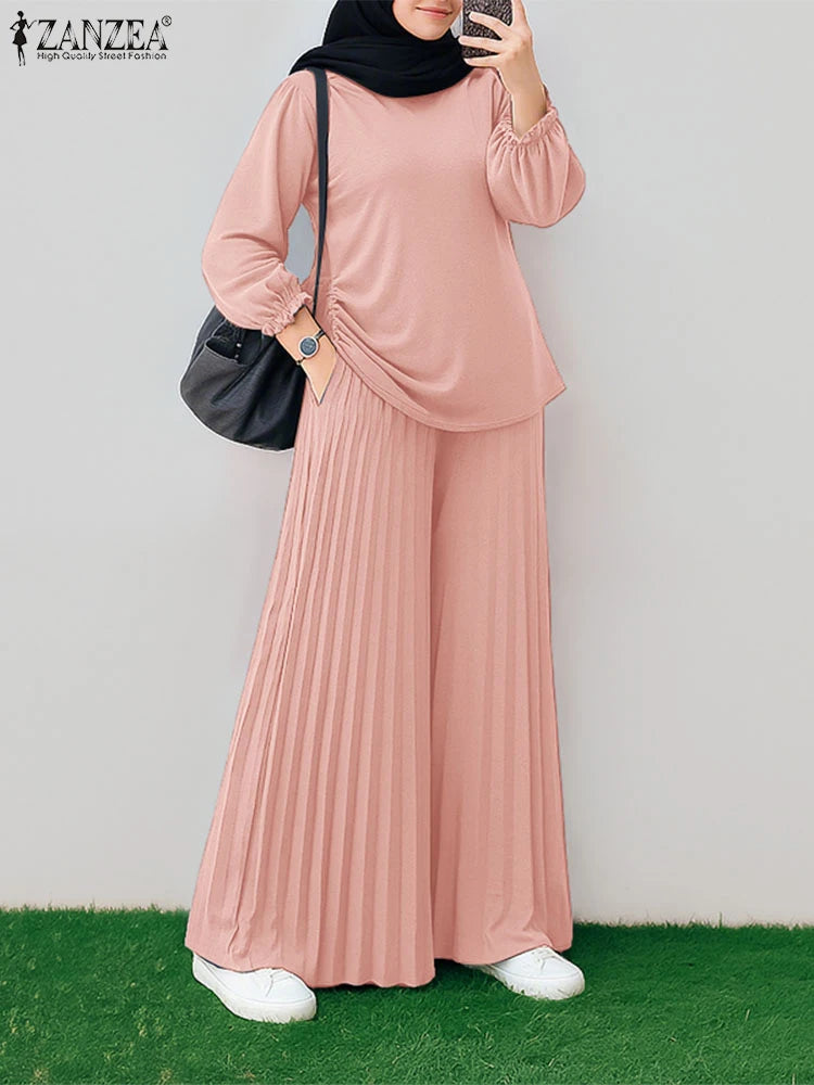 طقم نسائي محتشم قطعتين بتصميم أنيق – بلوزة بأكمام طويلة وبنطال واسع مريح