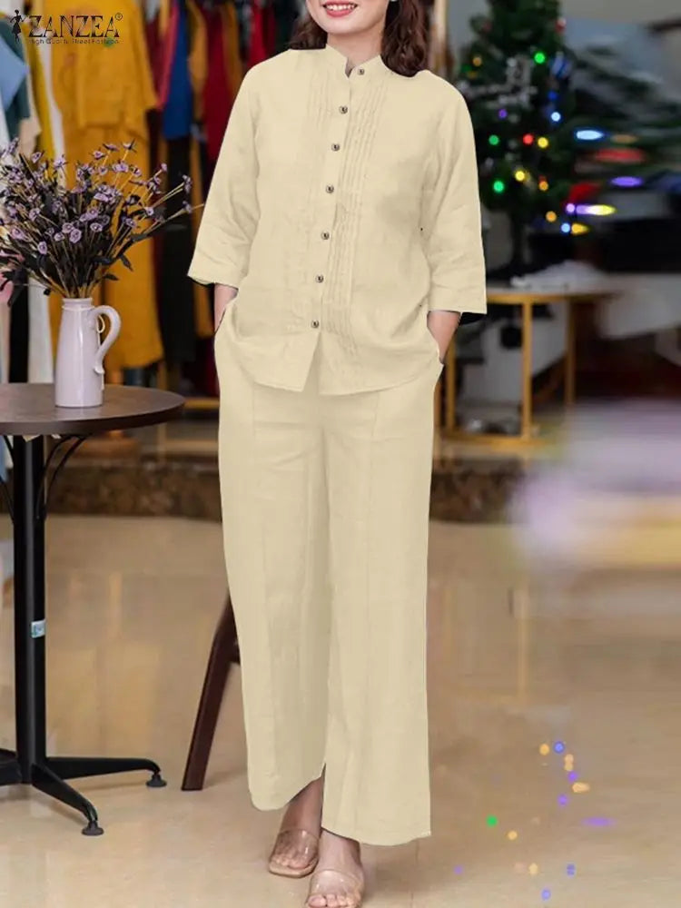 طقم نسائي أنيق قطعتين – بلوزة بأكمام طويلة وياقة واقفة مع بنطال واسع مريح