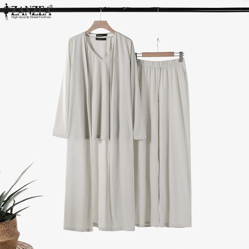 طقم نسائي أنيق ثلاث قطع – توب بدون أكمام مع كارديجان طويل وبنطال واسع مريح