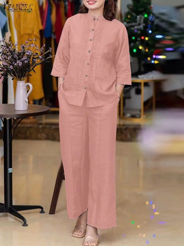 طقم نسائي أنيق قطعتين – بلوزة بأكمام طويلة وياقة واقفة مع بنطال واسع مريح