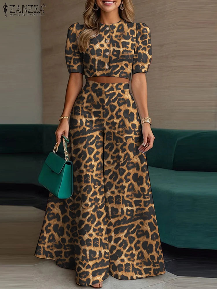 طقم نسائي صيفي أنيق قطعتين – بلوزة قصيرة بأكمام منفوشة مع بنطال واسع