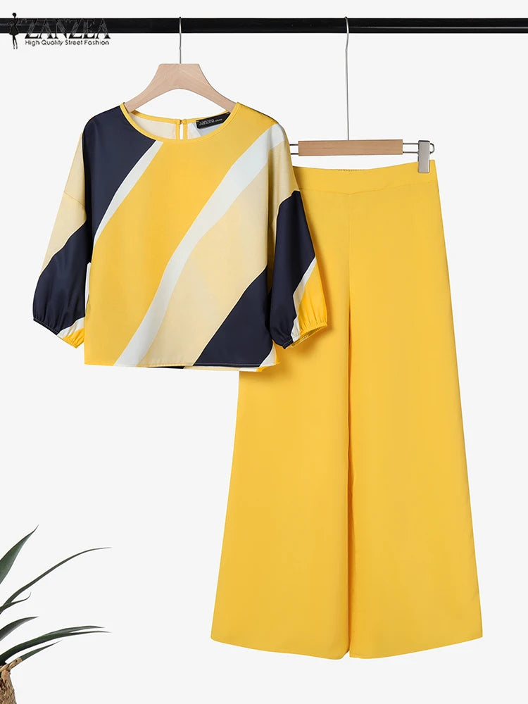 طقم نسائي أنيق قطعتين بطبعات عصرية – بلوزة بأكمام ¾ وبنطال واسع مريح