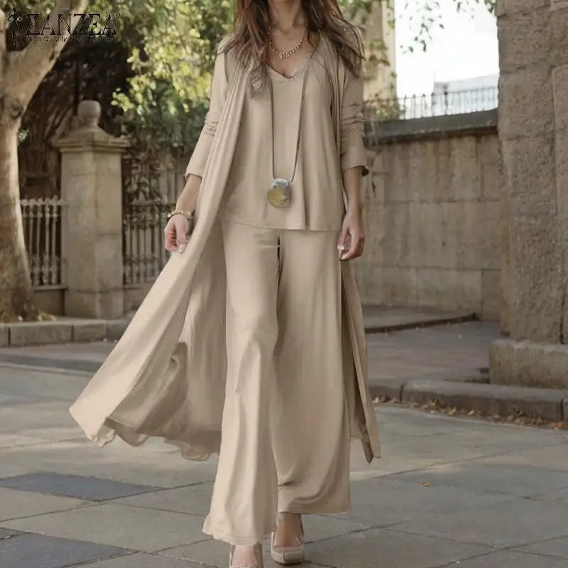 طقم نسائي أنيق ثلاث قطع – توب بدون أكمام مع كارديجان طويل وبنطال واسع مريح