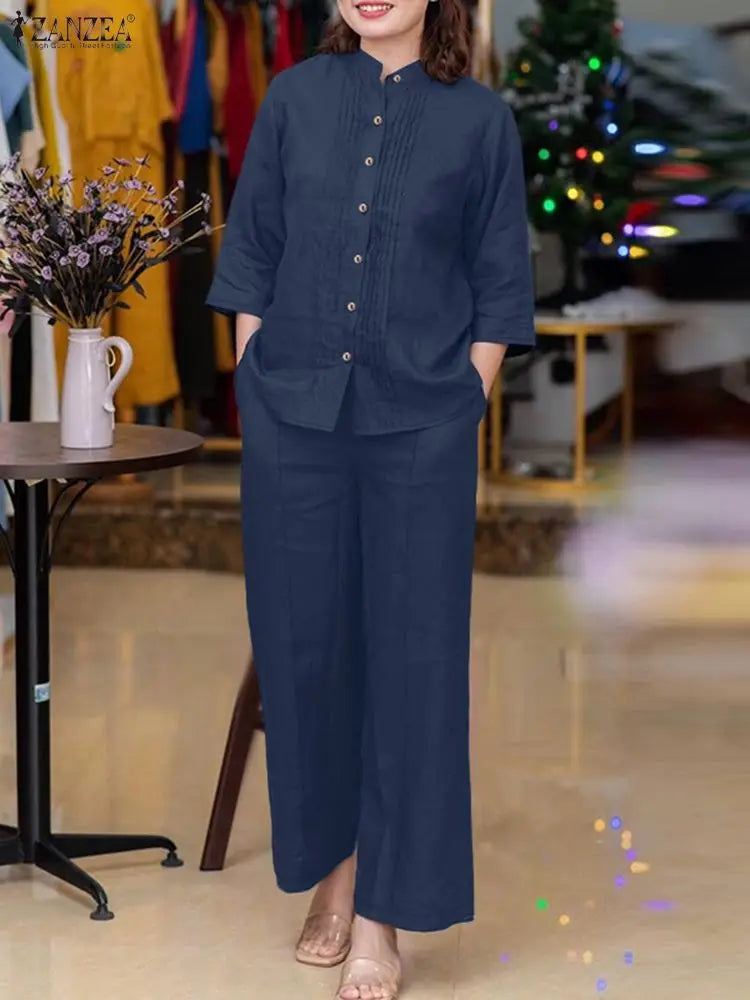 طقم نسائي أنيق قطعتين – بلوزة بأكمام طويلة وياقة واقفة مع بنطال واسع مريح