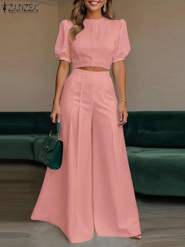 طقم نسائي صيفي أنيق قطعتين – بلوزة قصيرة بأكمام منفوشة مع بنطال واسع