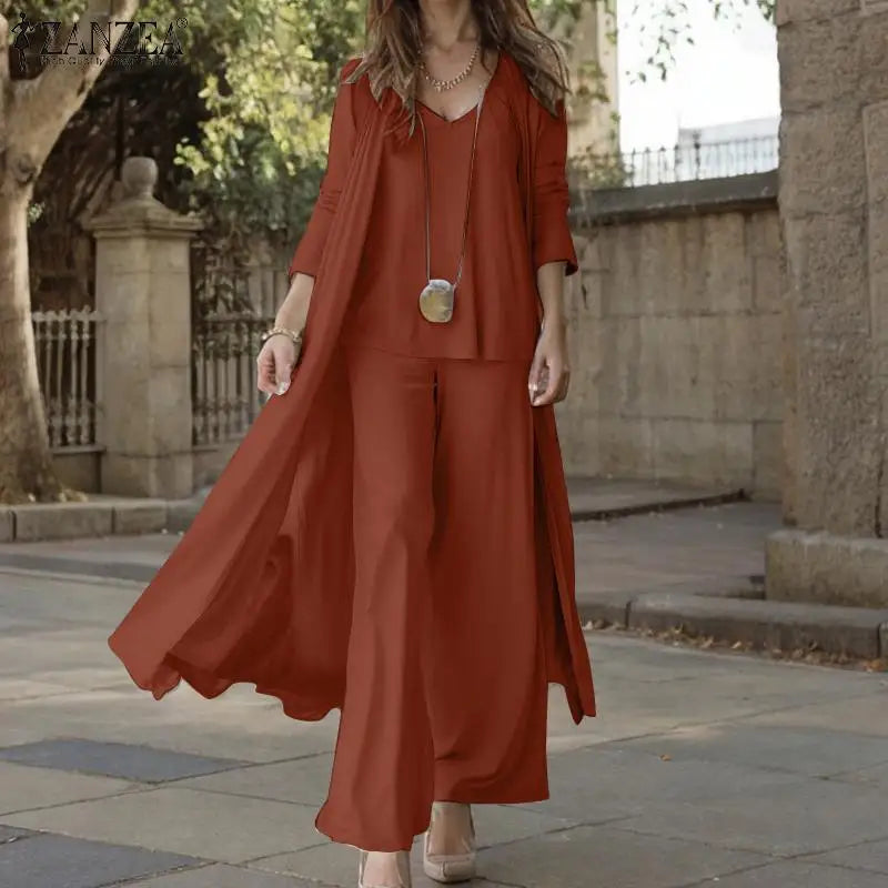 طقم نسائي أنيق ثلاث قطع – توب بدون أكمام مع كارديجان طويل وبنطال واسع مريح