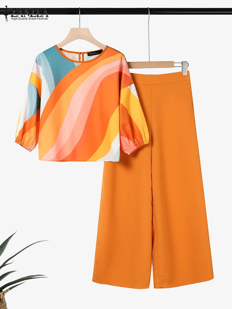 طقم نسائي أنيق قطعتين بطبعات عصرية – بلوزة بأكمام ¾ وبنطال واسع مريح