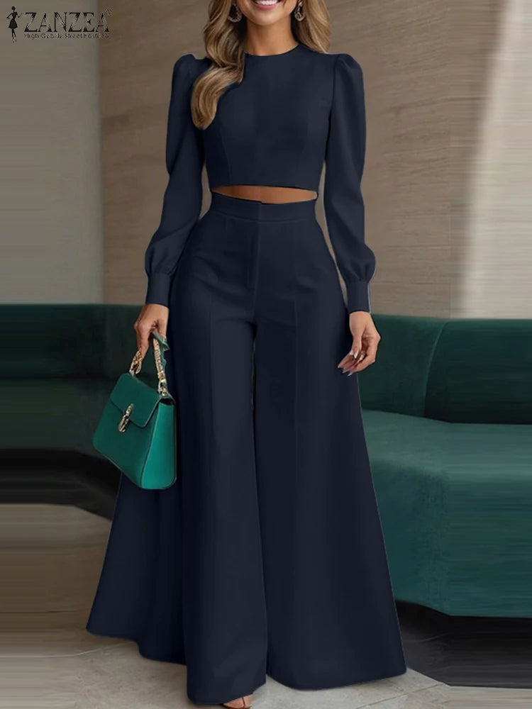 طقم نسائي صيفي أنيق قطعتين – بلوزة قصيرة بأكمام منفوشة مع بنطال واسع