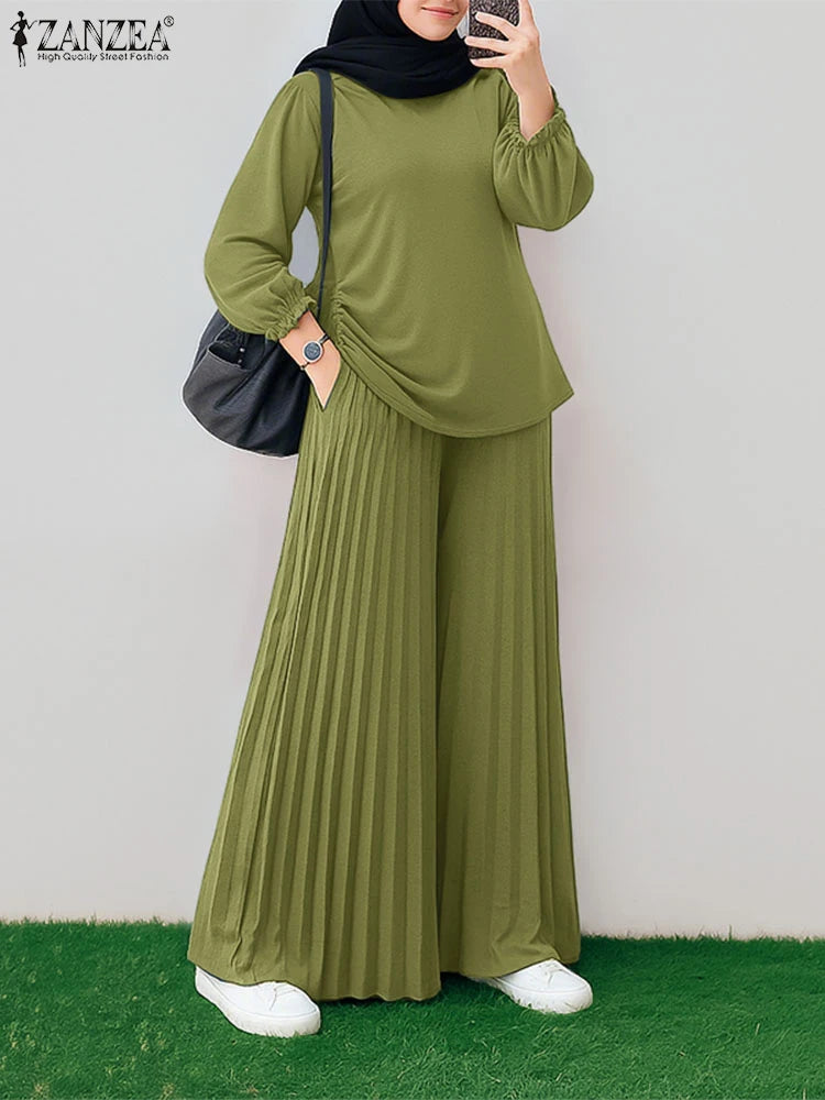 طقم نسائي محتشم قطعتين بتصميم أنيق – بلوزة بأكمام طويلة وبنطال واسع مريح