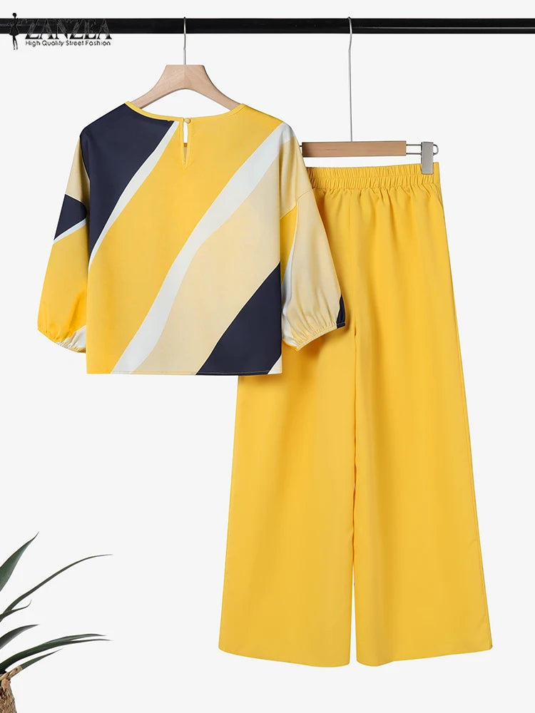 طقم نسائي أنيق قطعتين بطبعات عصرية – بلوزة بأكمام ¾ وبنطال واسع مريح