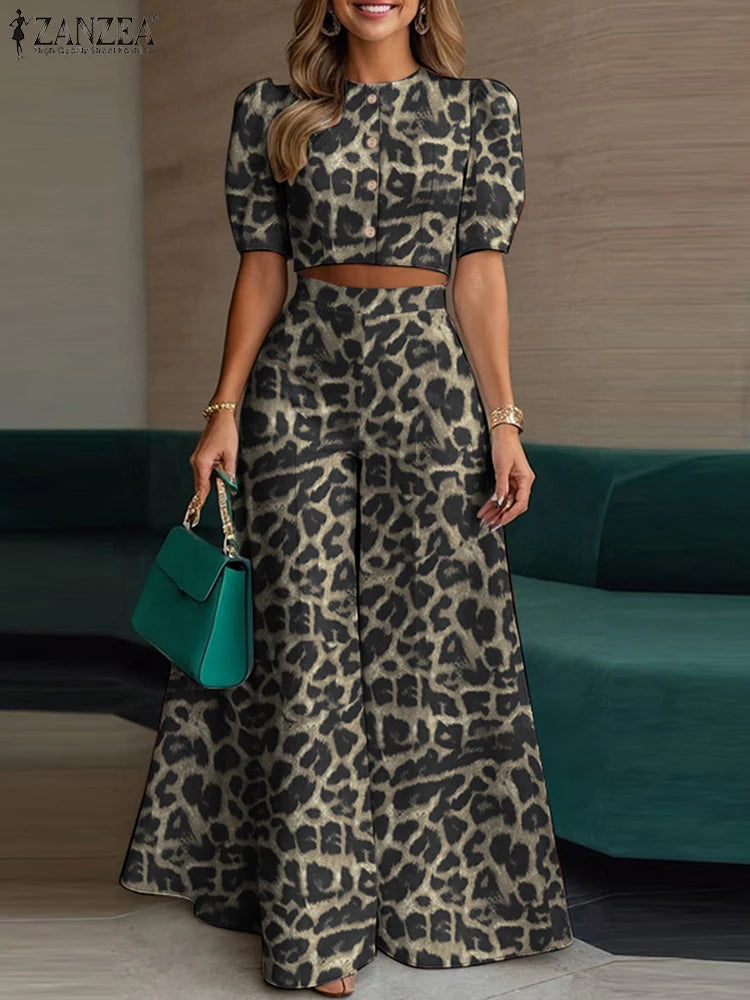 طقم نسائي صيفي أنيق قطعتين – بلوزة قصيرة بأكمام منفوشة مع بنطال واسع