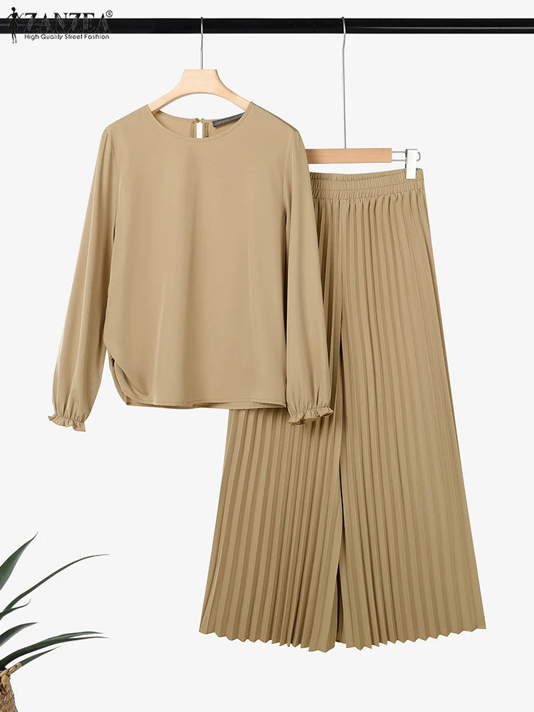 طقم نسائي محتشم قطعتين بتصميم أنيق – بلوزة بأكمام طويلة وبنطال واسع مريح