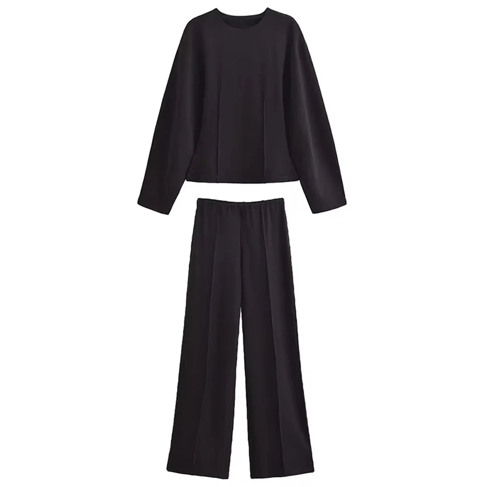طقم نسائي أنيق قطعتين – بلوزة بأكمام طويلة وياقة دائرية مع بنطال واسع مريح