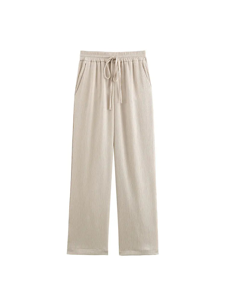 طقم نسائي رسمي أنيق – بليزر بأزرار مزدوجة مع بنطال واسع