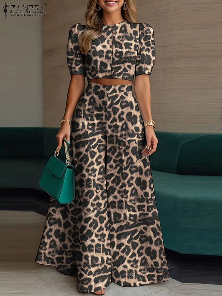 طقم نسائي صيفي أنيق قطعتين – بلوزة قصيرة بأكمام منفوشة مع بنطال واسع