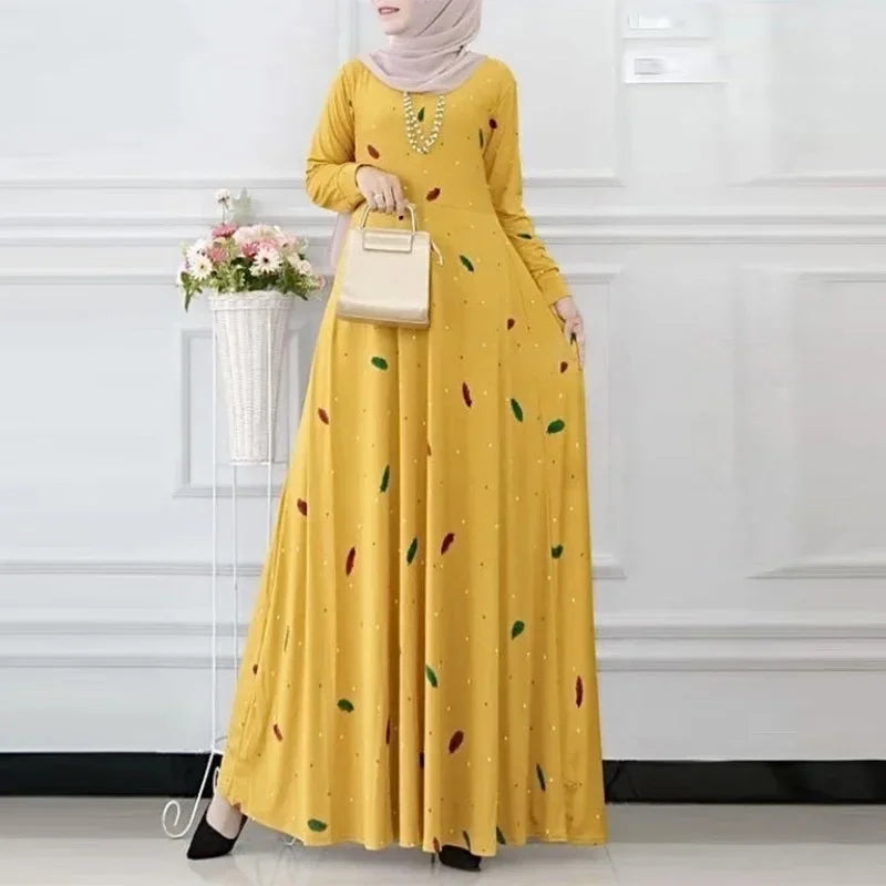 فستان عباية نسائي طويل بنقشة أوراق أنيقة – فستان محتشم بتصميم بوهيمي مميز