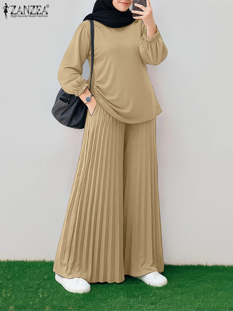 طقم نسائي محتشم قطعتين بتصميم أنيق – بلوزة بأكمام طويلة وبنطال واسع مريح